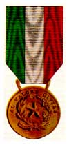 Medaglia d'Oro al Valor Civile.